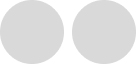 Two large, light gray circles are side by side on a plain white background.